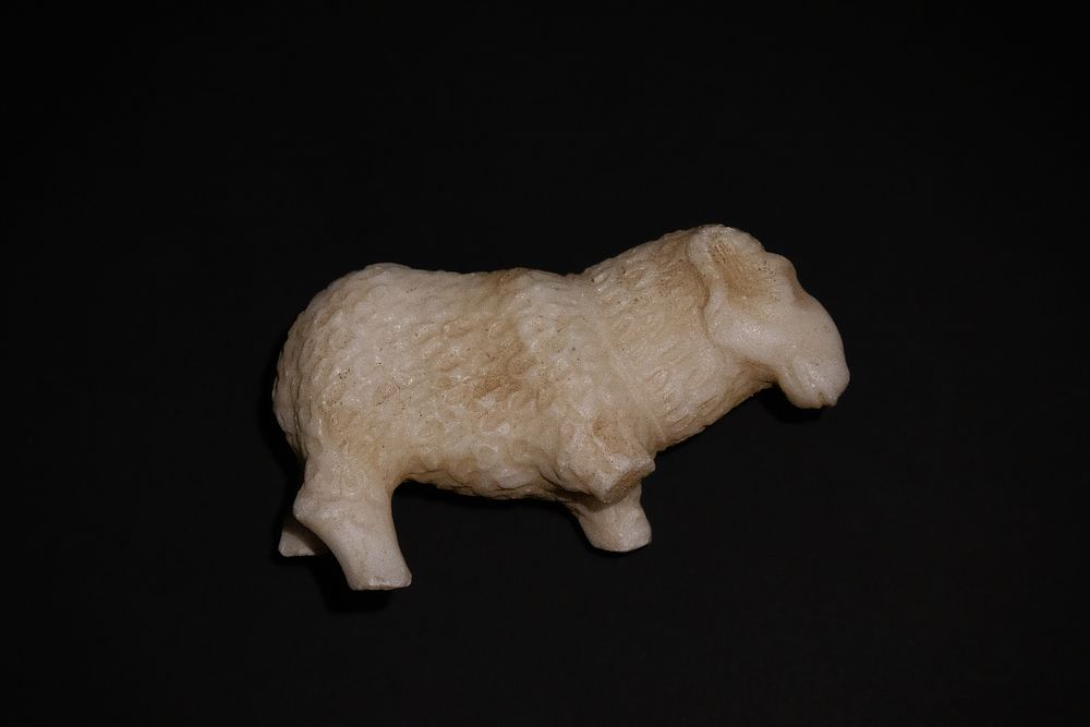 Lot 277: An Alabaster/ Marble Fragmentary Ram, Probably Hellenistic Period.