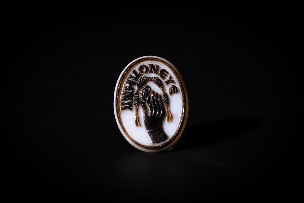 Lot 280: A Late Roman Cameo Depicting a Hand Pinching...