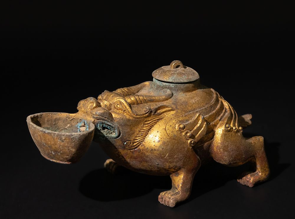 Lot 188: A Chinese Bronze Gilted Oil Lamp in the...
