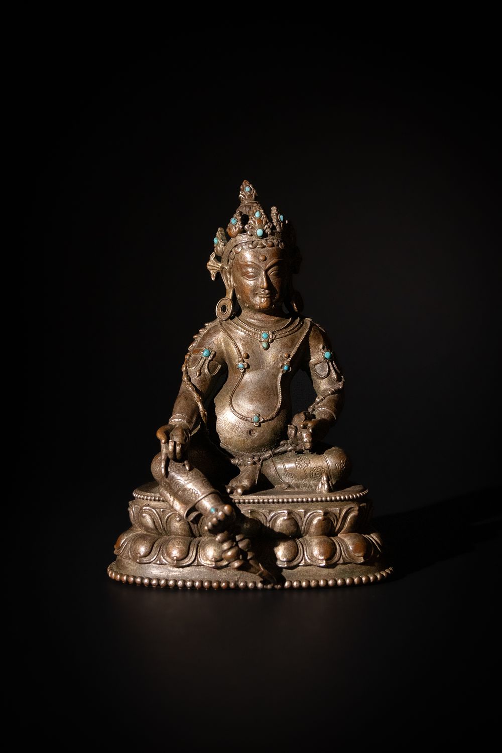 Lot 197: A Tibetan Bronze Platinum Gilted Jambhala Buddhist Statue,...