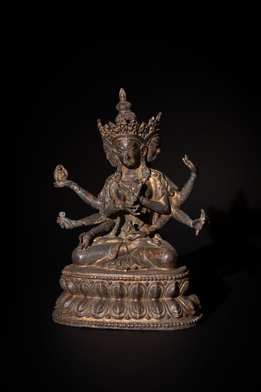 Lot 198: A Tibetan Bronze Gilted Ushnishavijaya Buddhist Statue.