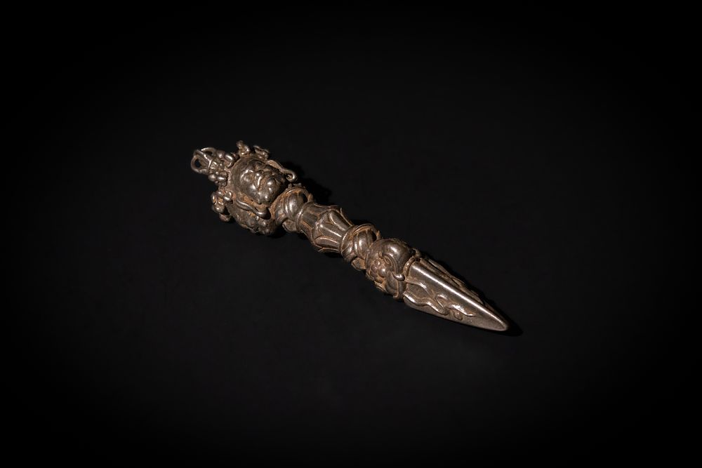 Lot 199: A Tibetan Buddhist Iron Mahakala Vajra Dagger, Depicting...