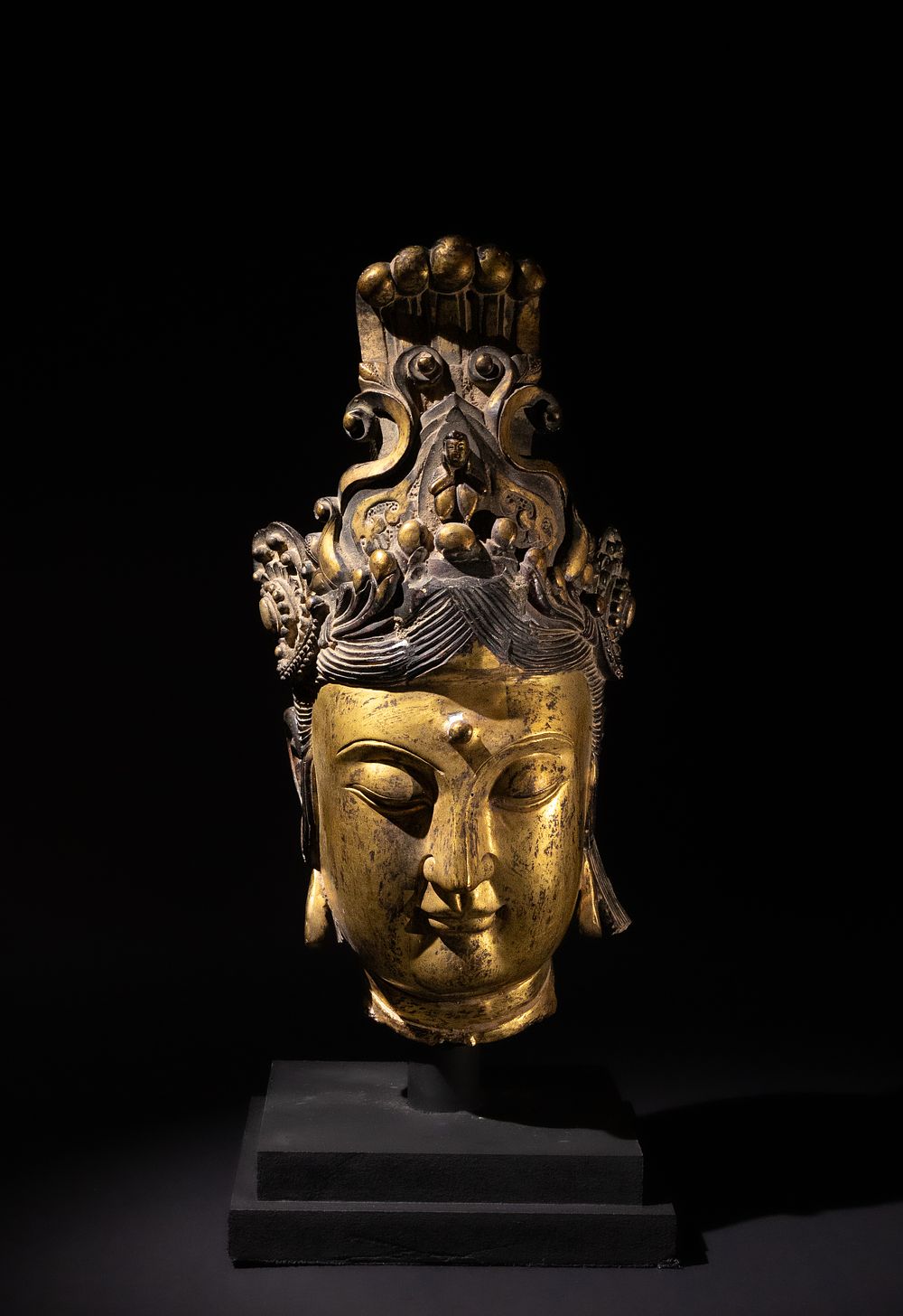 Lot 203: A Chinese Bronze Gilt Buddhist Head of Guanyin,...