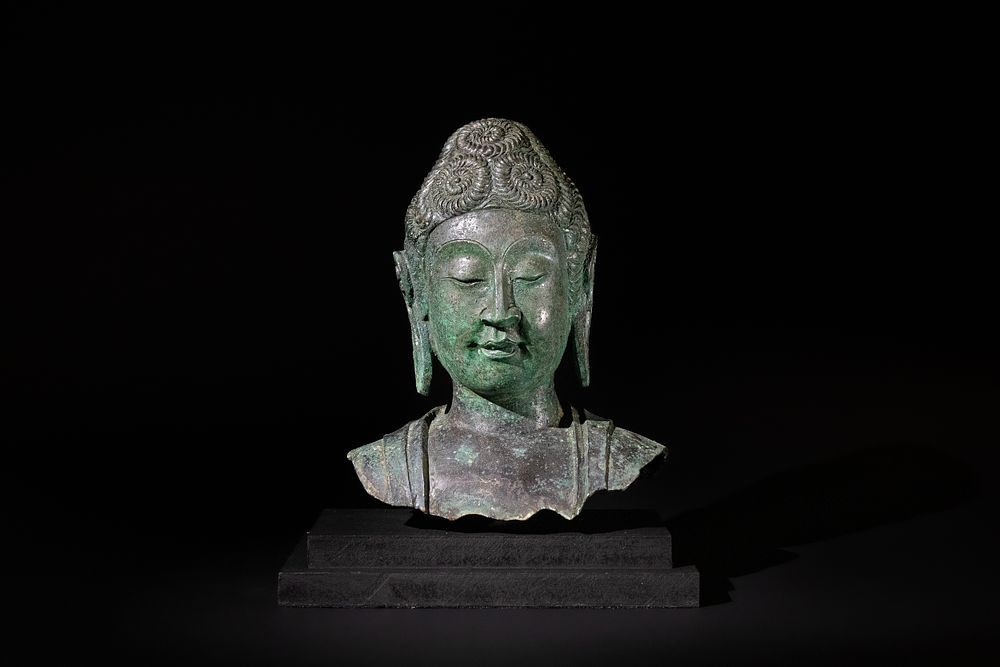 Lot 204: A Chinese Buddhist Bronze Bust of Female Deity.