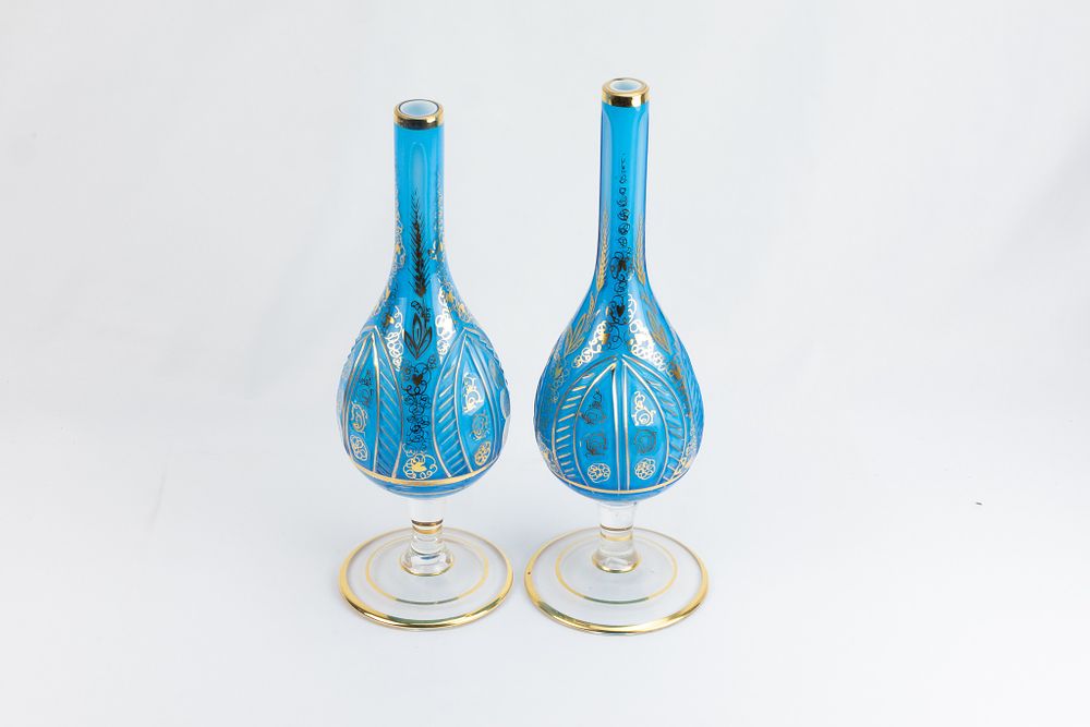 Lot 241: A Pair of Islamic Blue Glass Rose Water...
