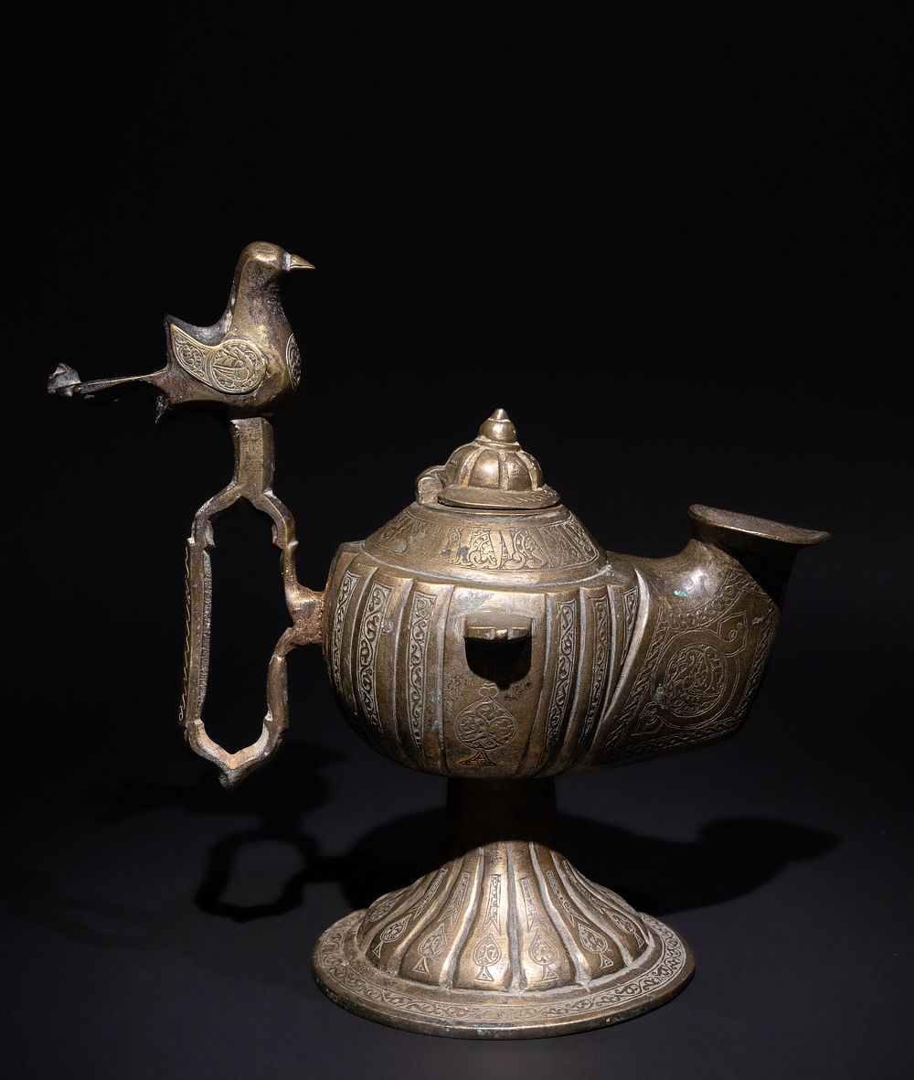 Lot 269: A Rare Islamic Seljuk Bronze Lidded Oil Lamp,...