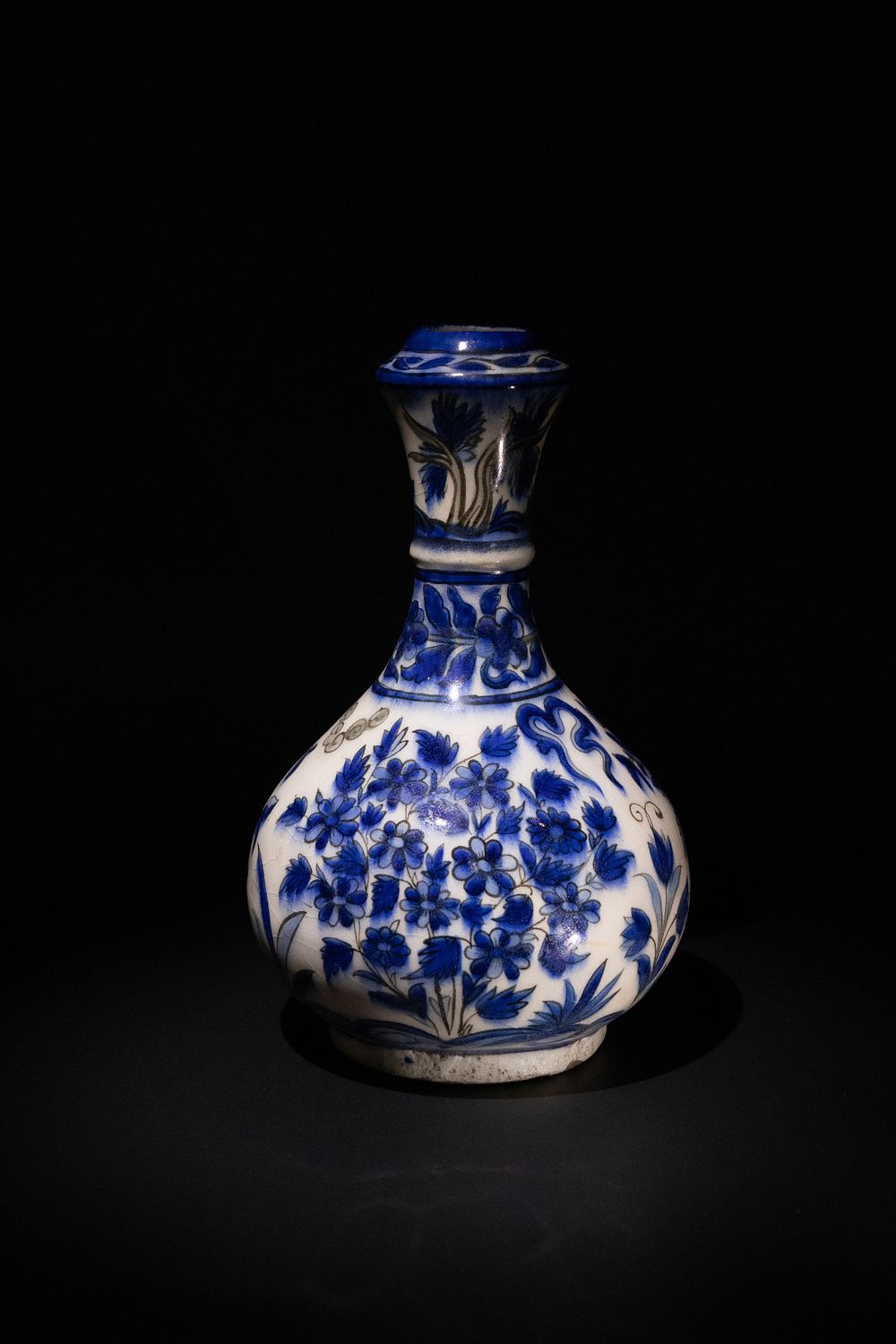 Lot 290: An Islamic Qajar Blue & White Vase, 19th...