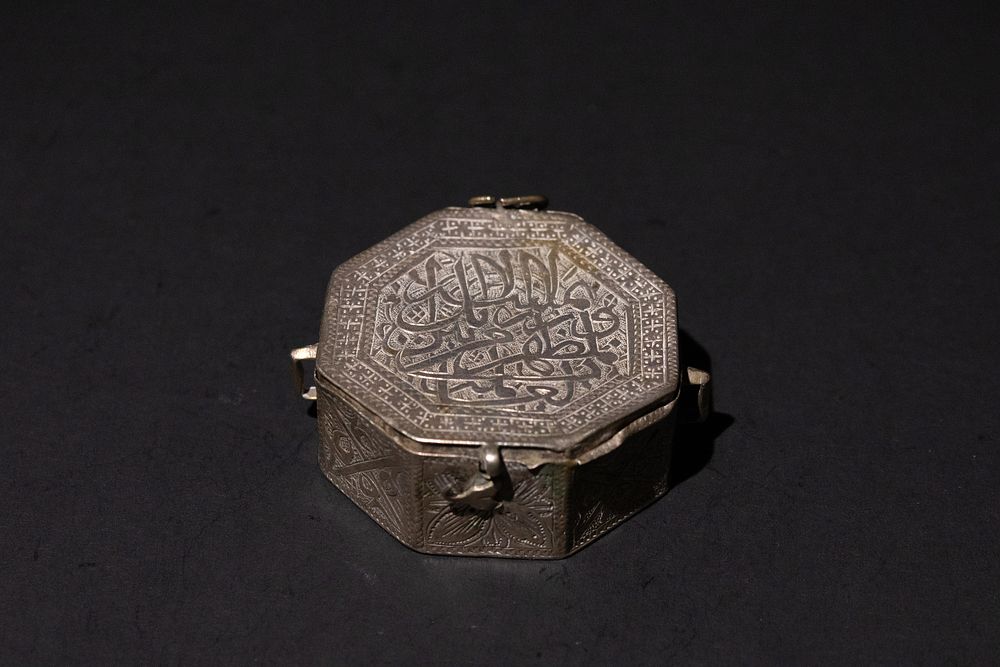 Lot 297: An Islamic Silver Hexagonal Bajuband Case, 19th Century....