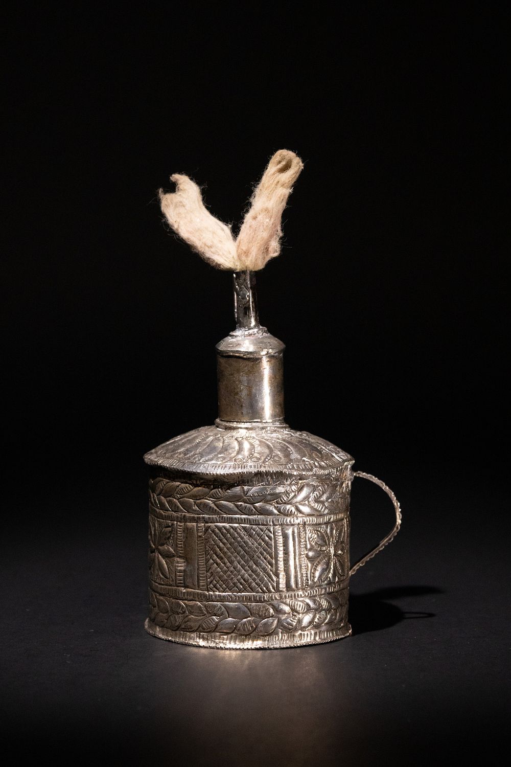Lot 299: An Islamic Moroccan Silver Engraved Oil Lamp with...