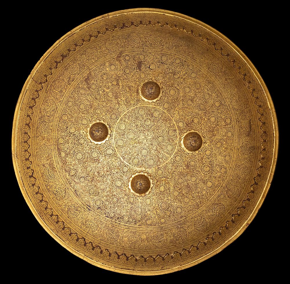 Lot 313: An Islamic Indo-Persian Iron Engraved Shield, 19th Century,...