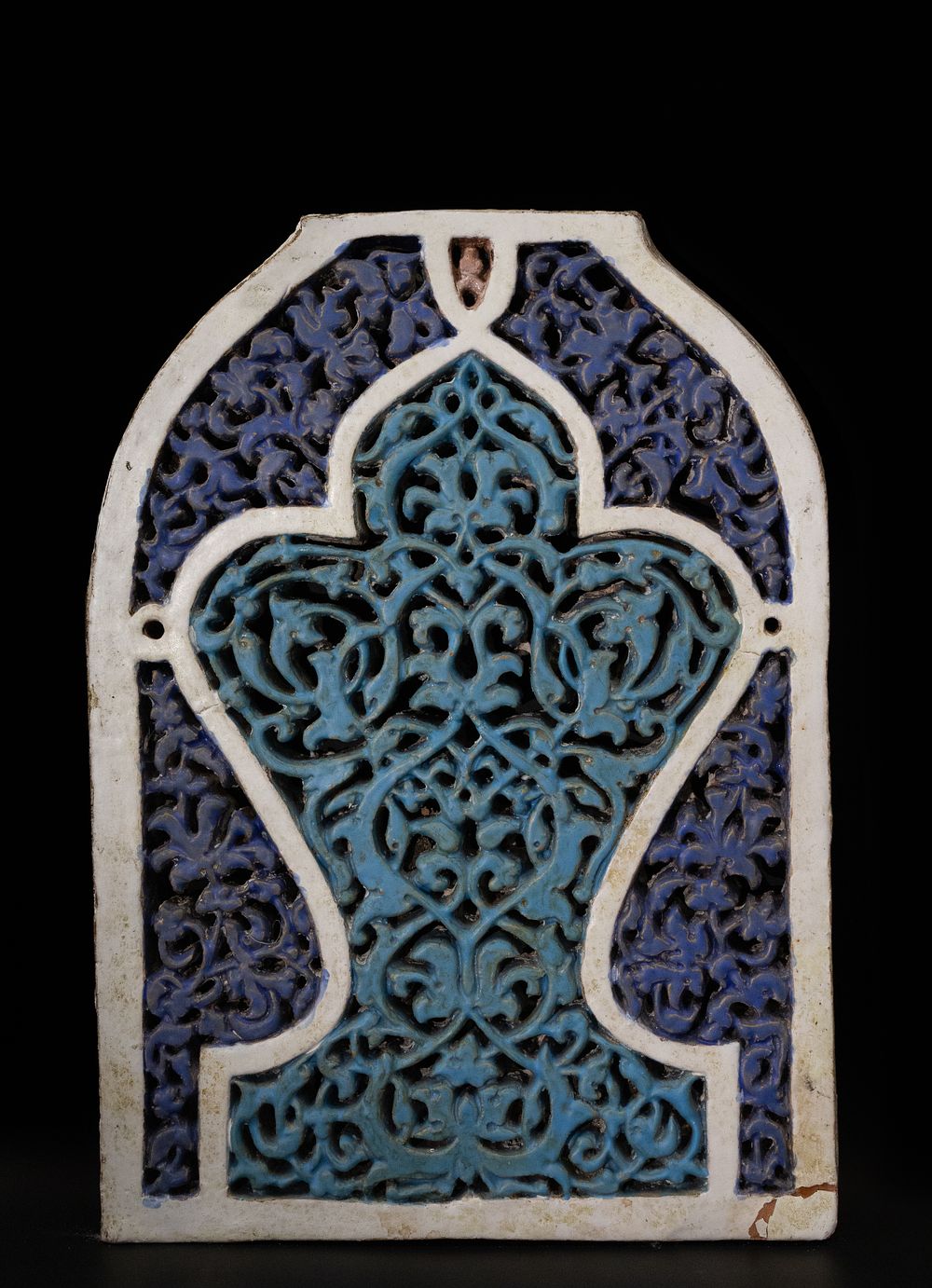 Lot 316: A Rare Islamic Deeply Carved Dark Blue &...