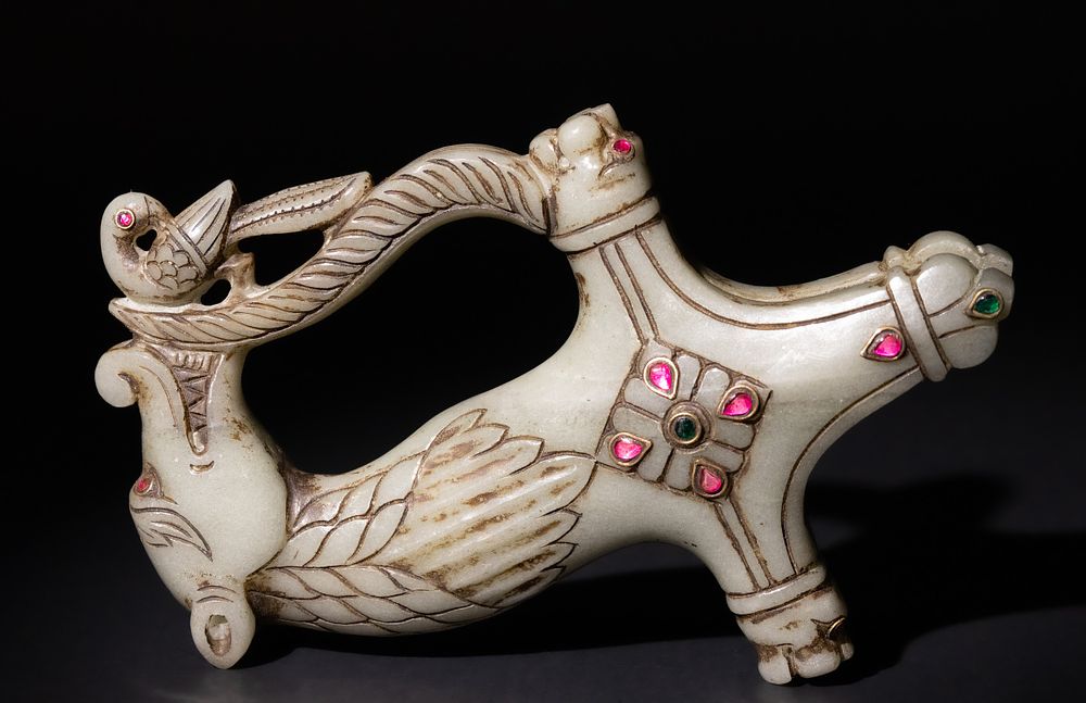Lot 324: An Islamic Indian Mughal Style Jade Dagger Handle...