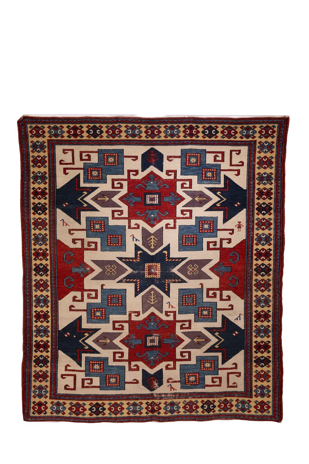 Lot 344: A Caucasian Star Kazak Wool Rug, 19th Century.