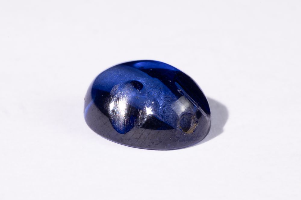 Lot 173: An Indian Blue Gemstone Bead, Possibly Sapphire.