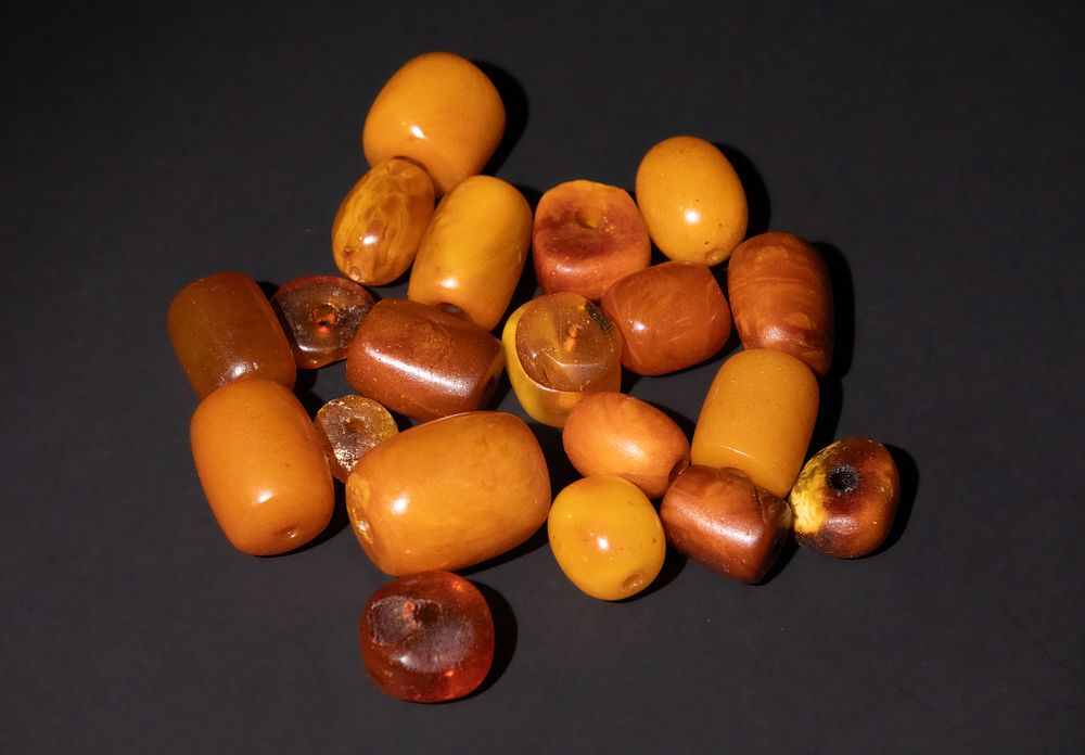 Lot 193: A Collection of Assorted Amber Beads.