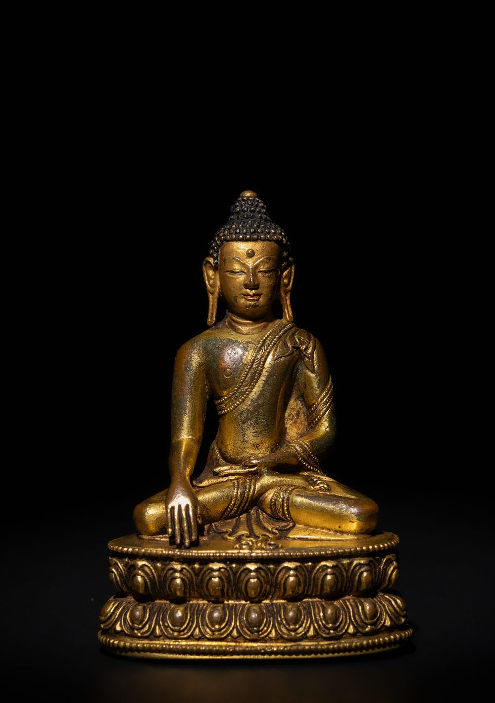 Lot 209: A Tibetan Gilded Bronze Statue Representing Gautama, 19th...