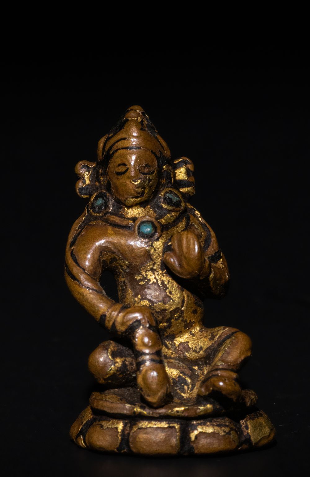 Lot 213: A Tibetan Gilded Bronze Statue of a Seated...