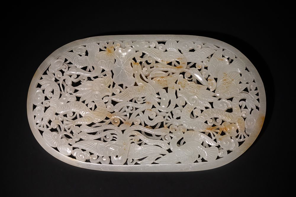 Lot 243: A Chinese White Jade Openwork Plaque with Phoenix...