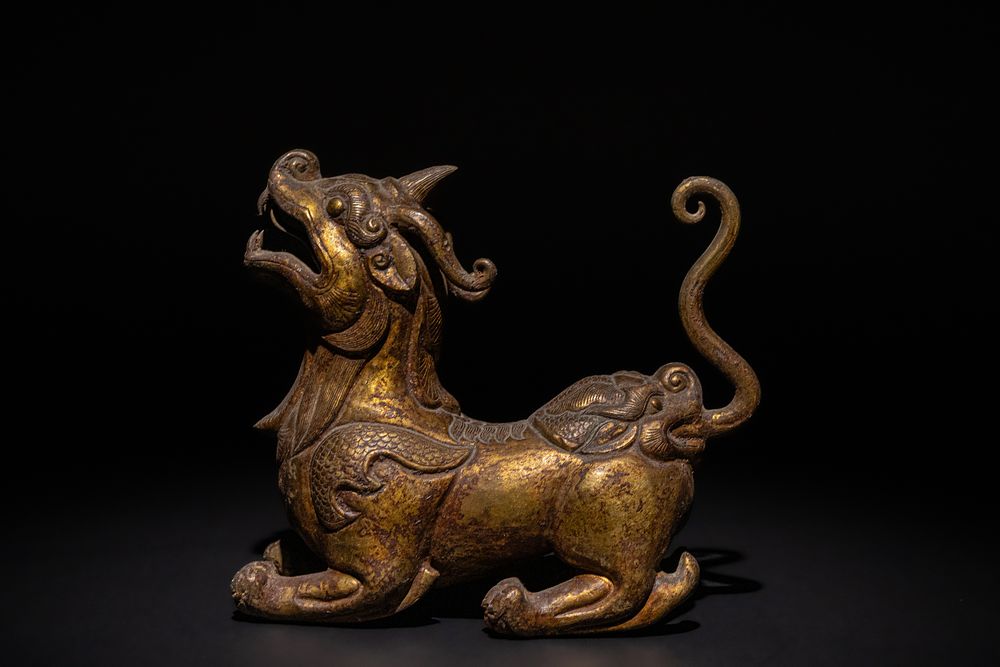 Lot 244: A Chinese Gilded Bronze Foo Dog, 19th Century...
