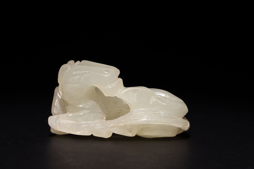 Lot 257: A Chinese Green Jade Carving of a Horse,...
