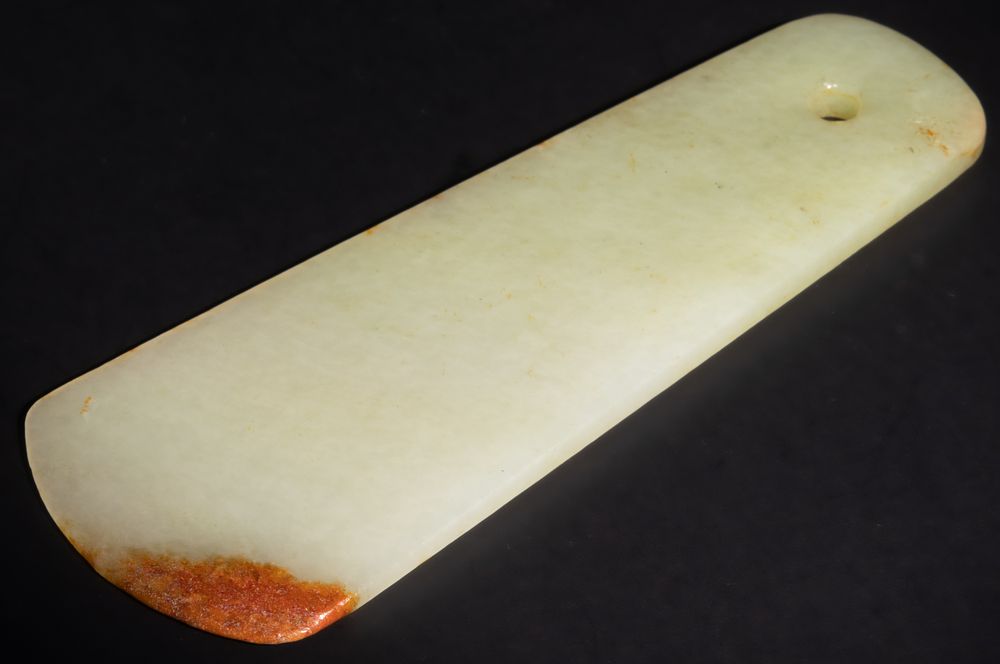 Lot 260: A Chinese Jade Axe Head, 19th Century.