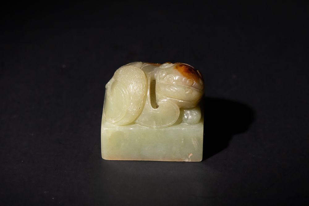 Lot 275: A Chinese Jade Seal with Mythical Beast Finial.