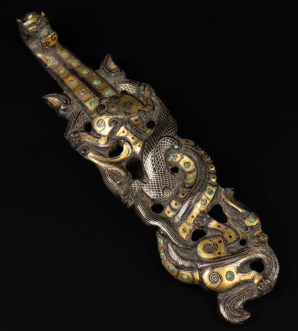 Lot 278: A Chinese Bronze Belt Buckle with Silver and...