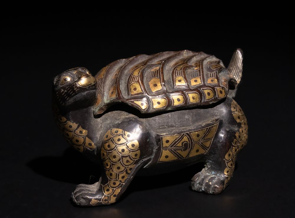 Lot 279: A Chinese Bronze Tortoise Container with Gold Inlay,...