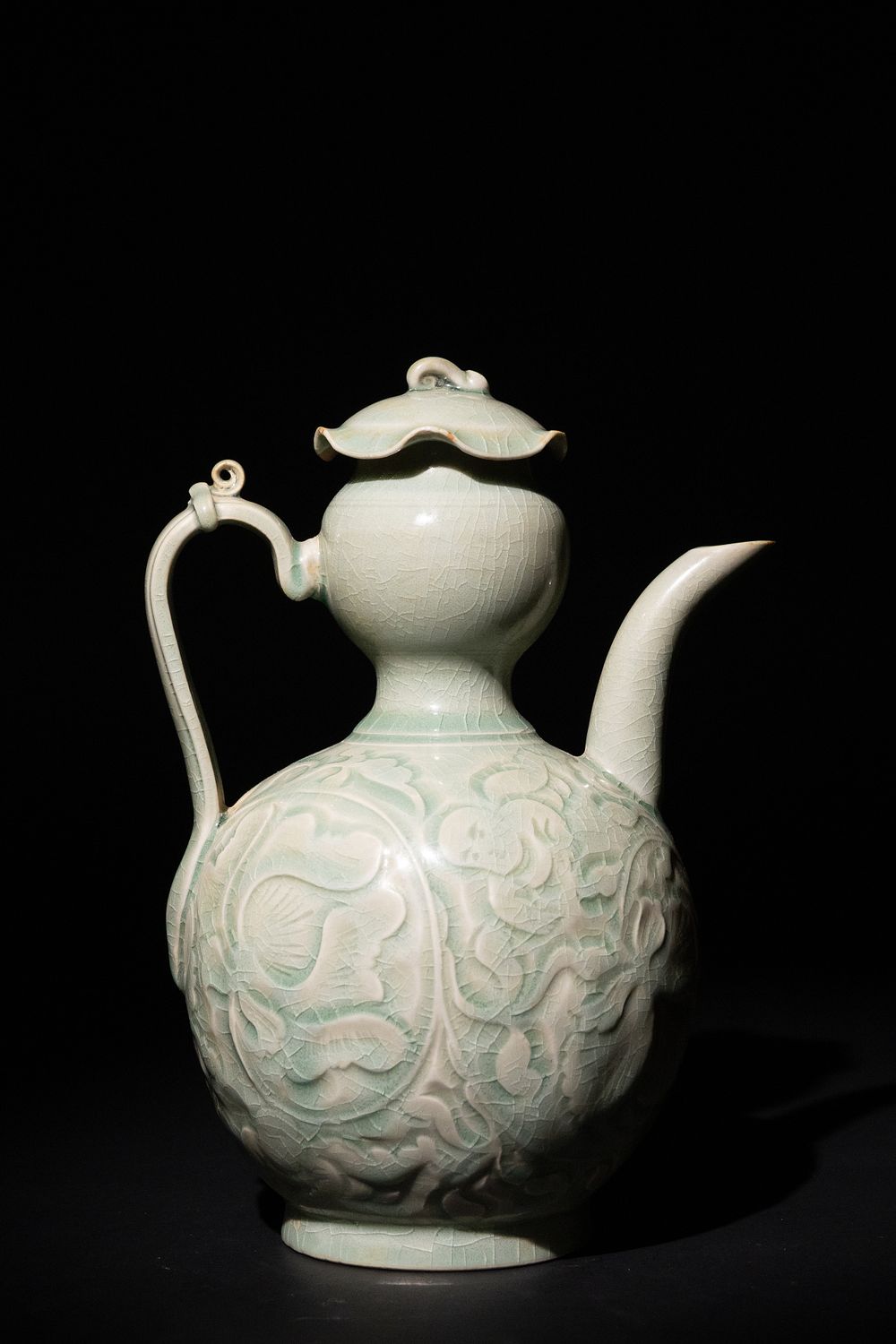 Lot 154: A Chinese Celadon Glazed Porcelain Ewer with Floral...