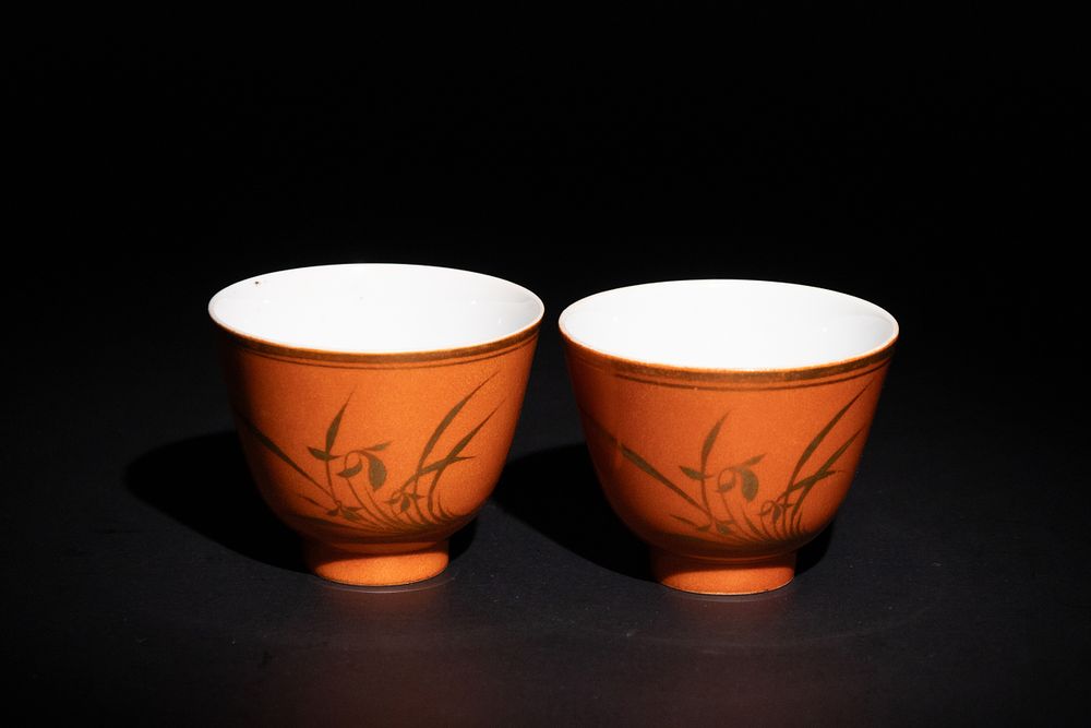 Lot 162: A Pair of Chinese Porcelain Orange Ground Teacups...