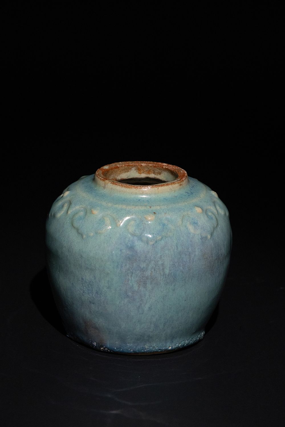 Lot 171: A Chinese Celadon-Glazed Ceramic Jar, 19th Century.
