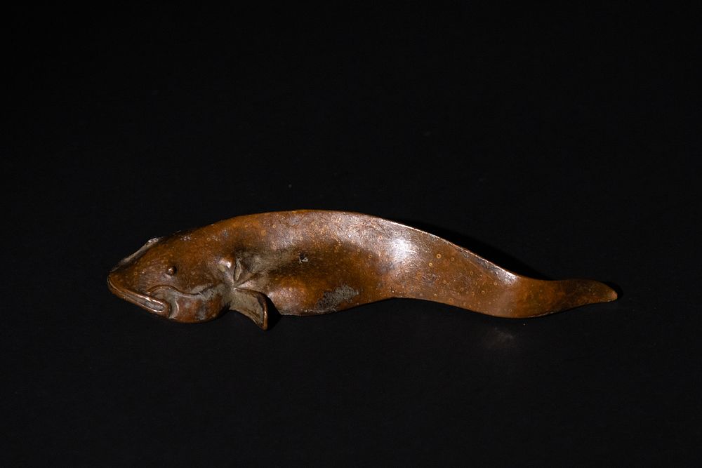 Lot 180: A Japanese Bronze Figure of a Catfish.