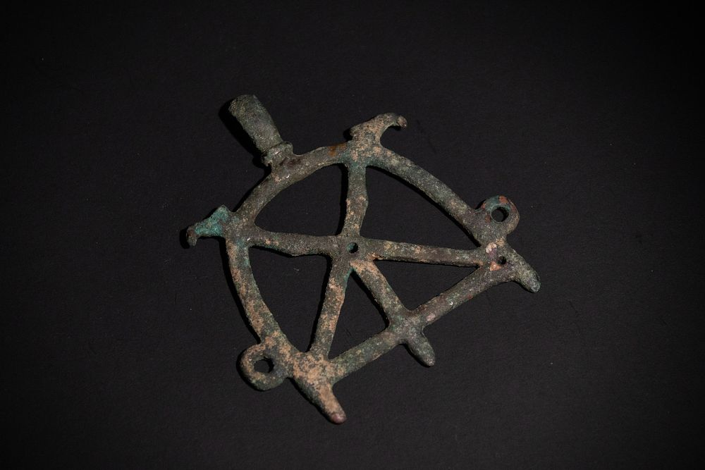 Lot 275: A Luristani Bronze Openwork Pendant, 1200-650 BCE.
