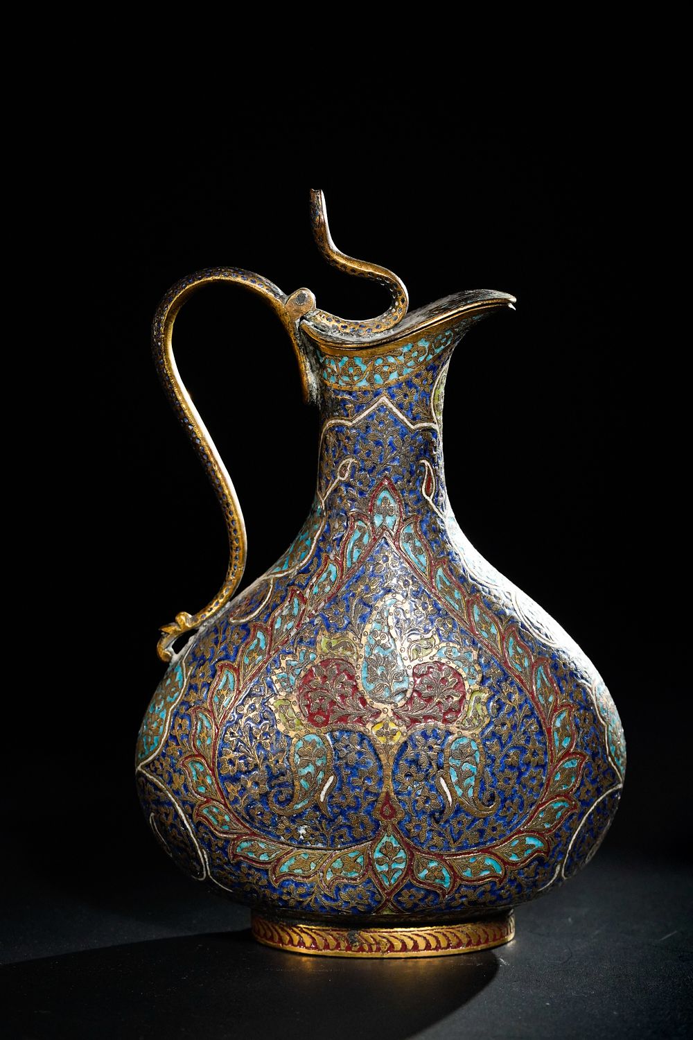 Lot 155: An Indian Kashmiri Gilt Copper Enamelled Ewer, 19th...