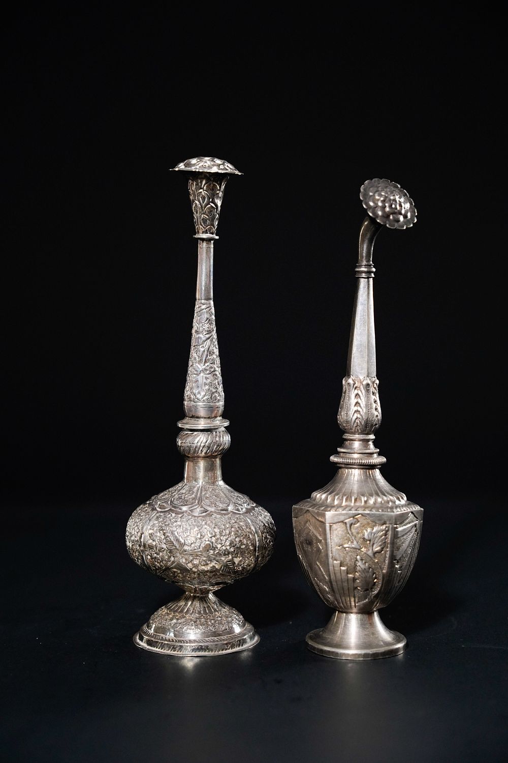 Lot 161: A Pair of Indian Silver Rose Water Sprinklers.