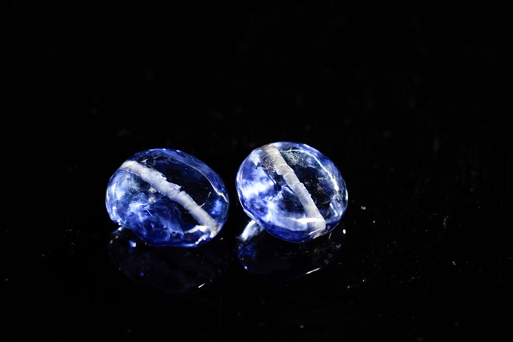 Lot 171: A Pair of Indian Polished Blue Gemstones, Possibly...