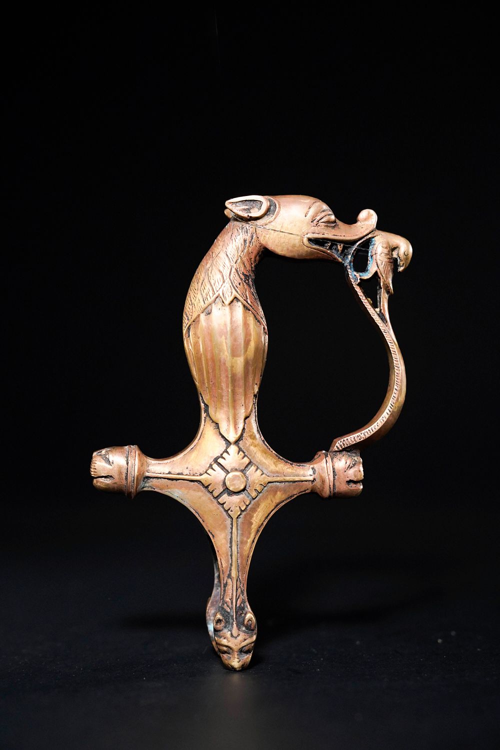 Lot 172: A Indian Brass Sword Handle with Zoomorphic Finial,...