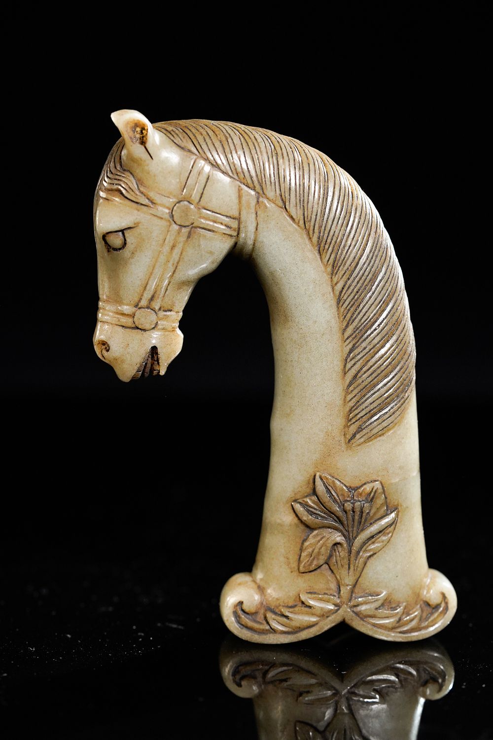 Lot 174: A Mughal Jade Horse-Head Dagger Hilt with Floral...