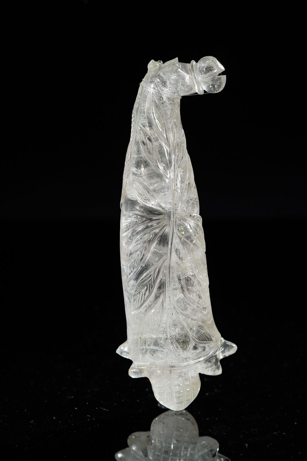 Lot 175: A Mughal Rock Crystal Horse-Head Dagger Hilt, 19th...