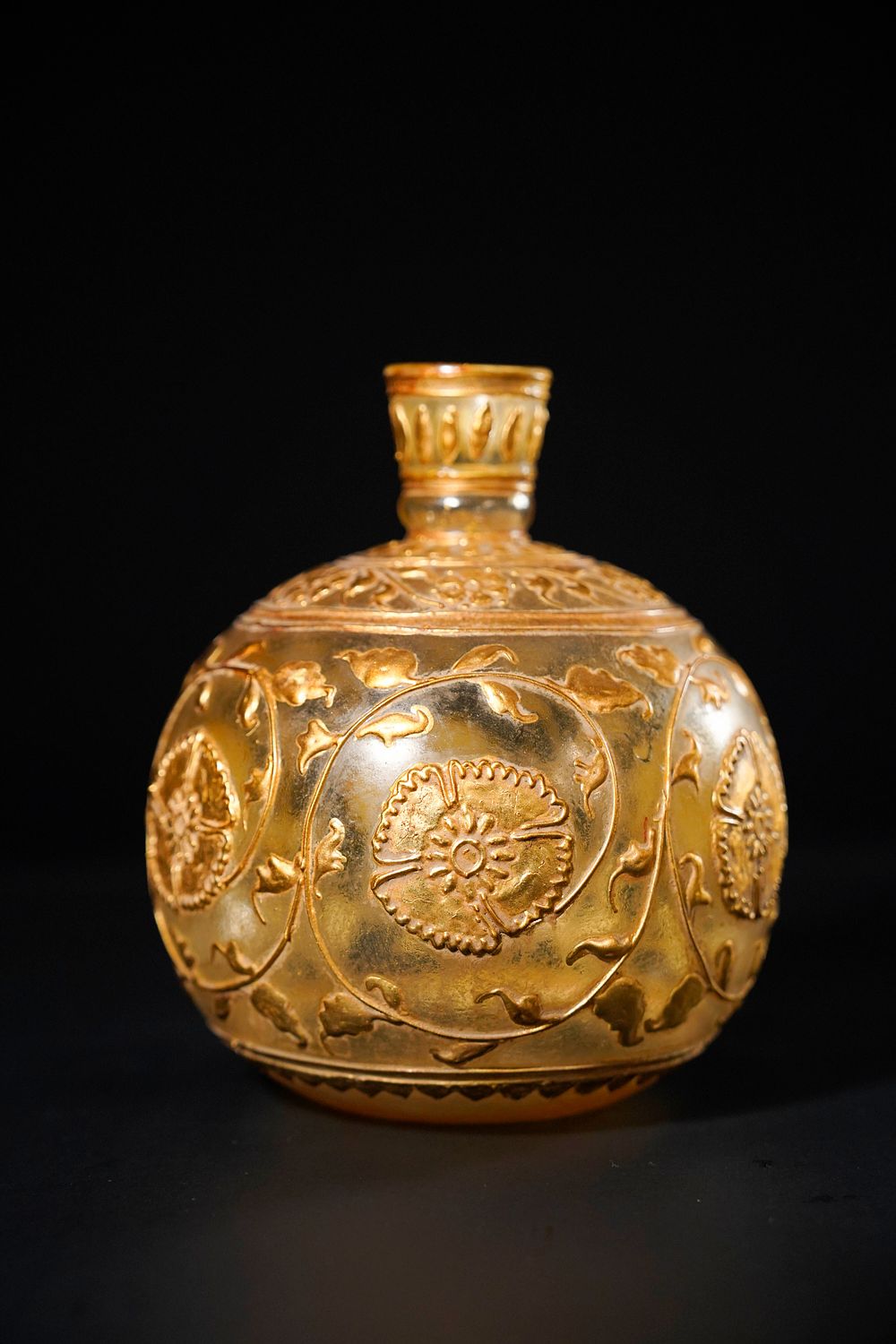 Lot 180: A Mughal Gilt Glass Hookah Base, 19th-20th Century.