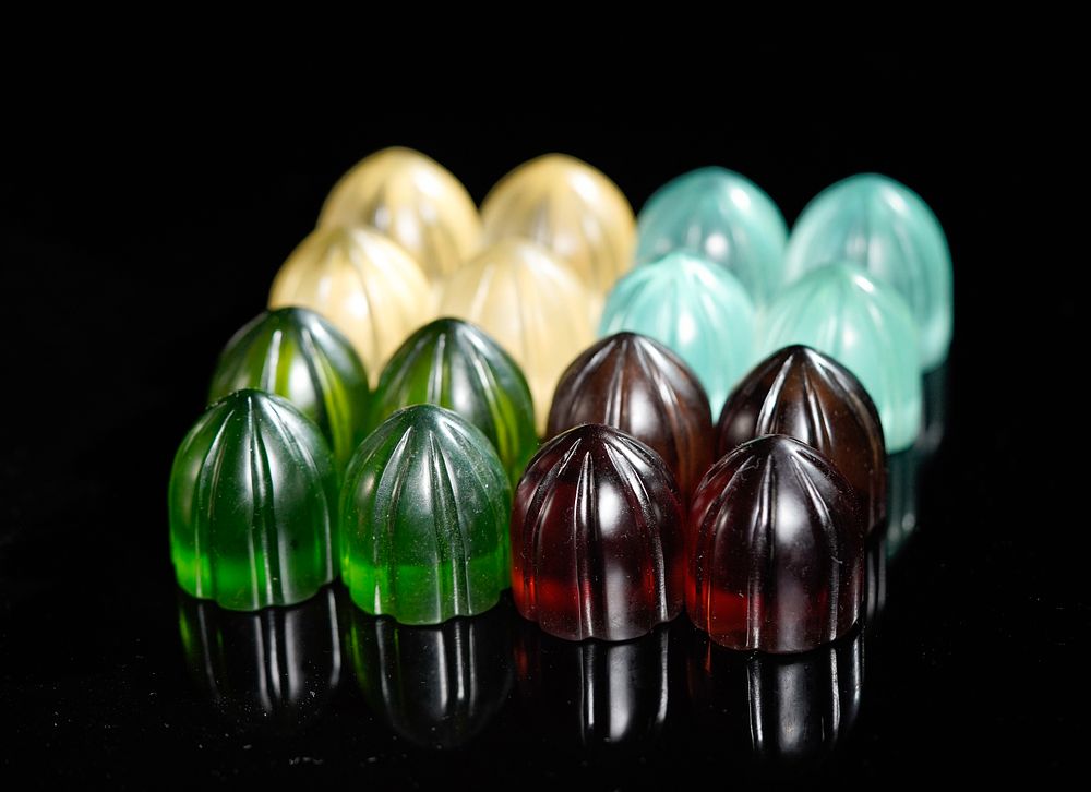Lot 182: A Set of Indian Glass Pachisi Game Pieces...