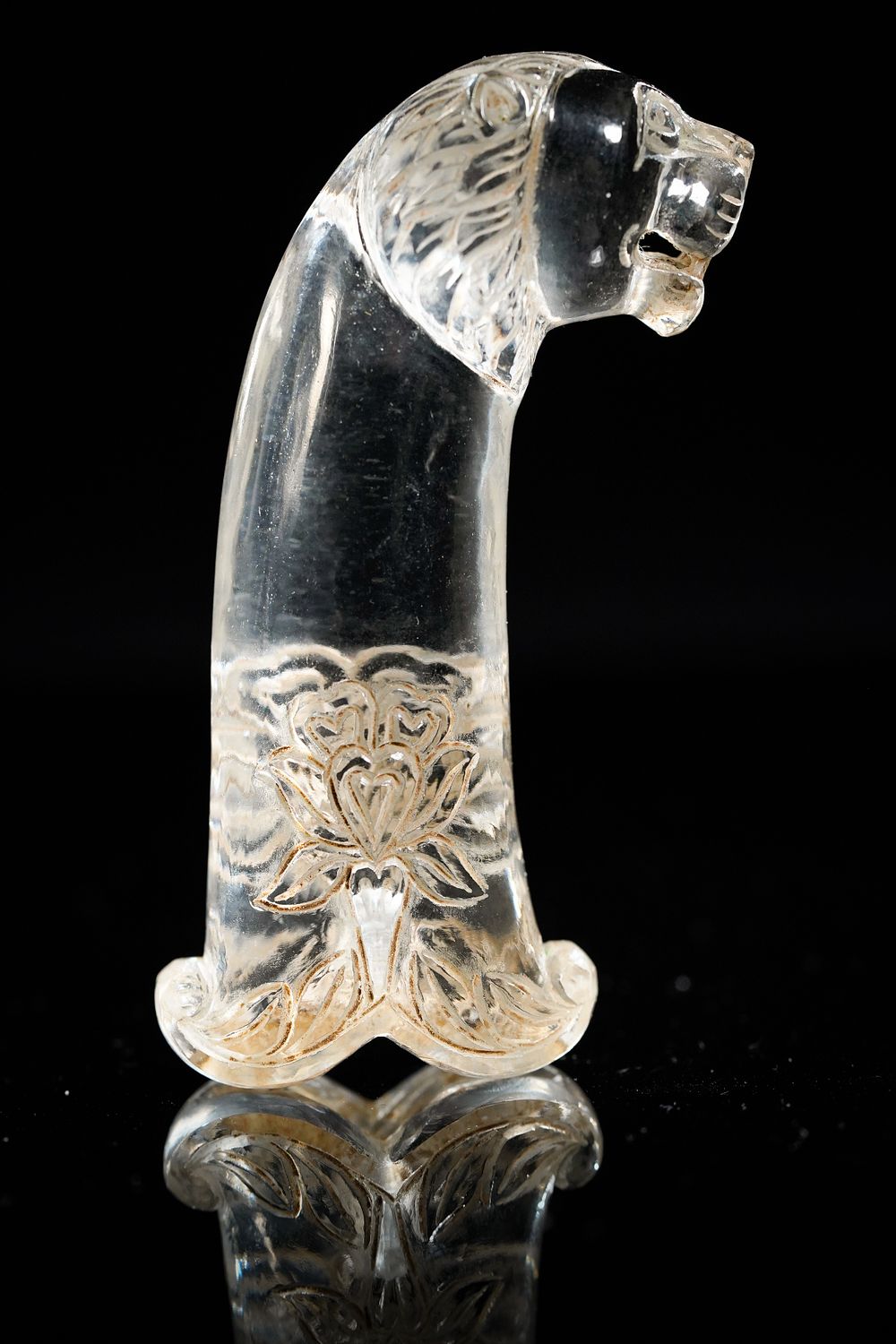 Lot 185: A Mughal Rock Crystal Dagger Hilt with Lion-Head...