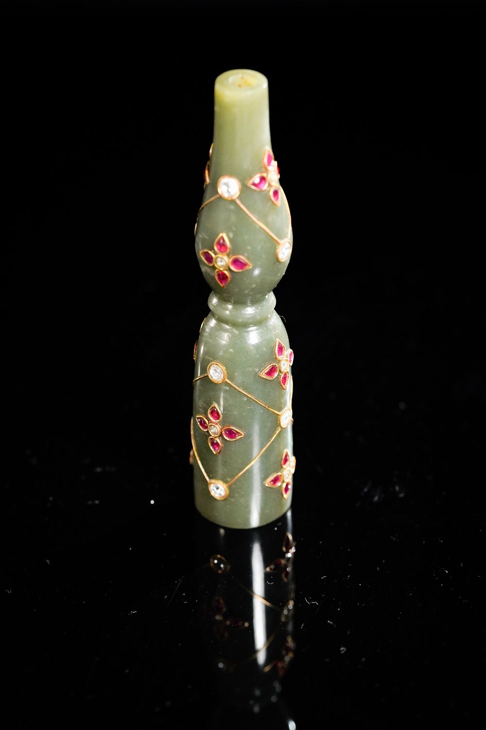Lot 186: A Mughal Jade Hookah Mouthpiece Inlaid with Gemstones,...