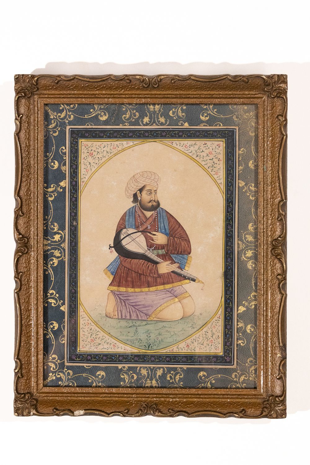 Lot 224: An Indian Miniature Painting of a Seated Musician...