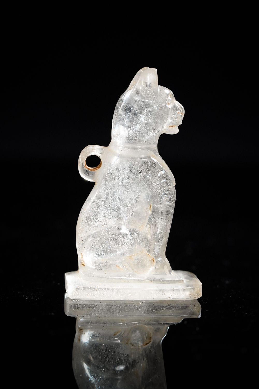 Lot 242: An Egyptian Rock Crystal Cat Amulet, Late Period...