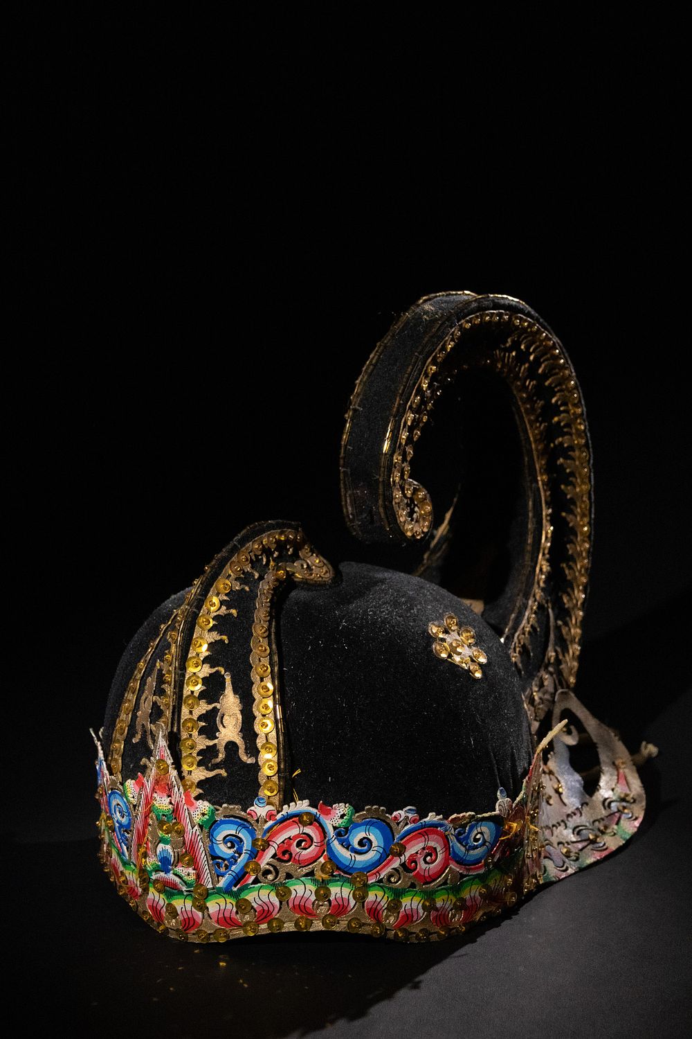 Lot 256: An Indonesian Hand Stitched Velvet Costume Hat, 19th...