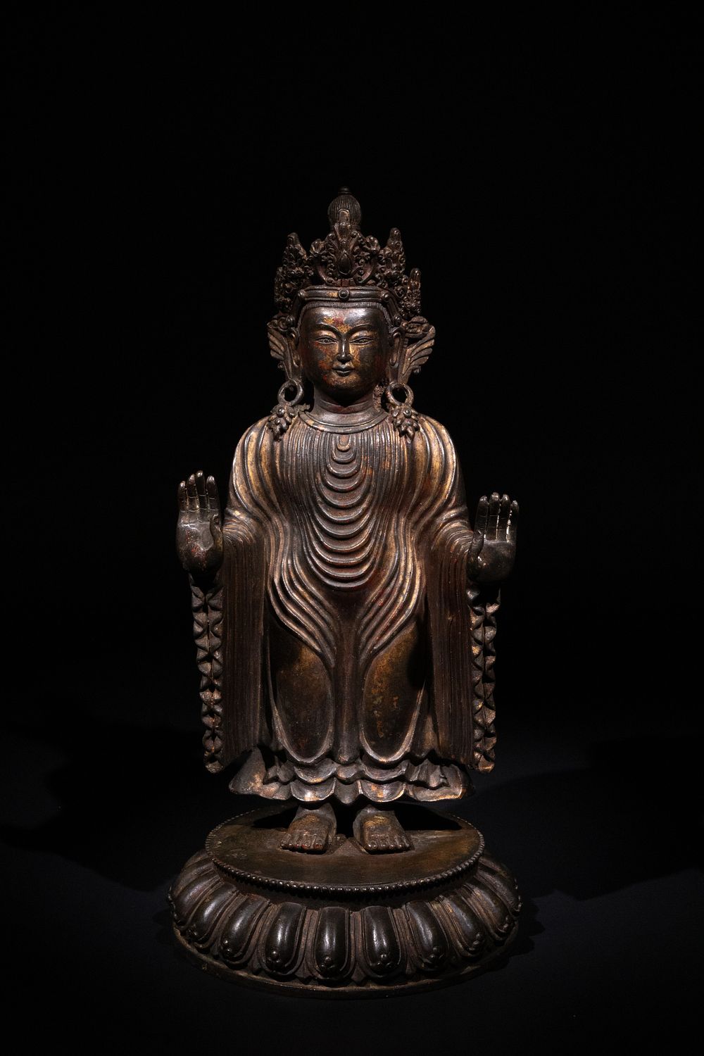 Lot 258: A Large Tibetan Gilt Bronze Standing Figure of...