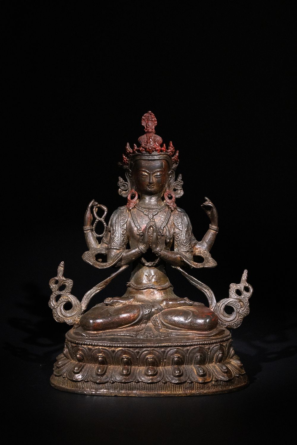 Lot 261: A Tibetan Bronze Seated Figure of Avalokiteshvara.