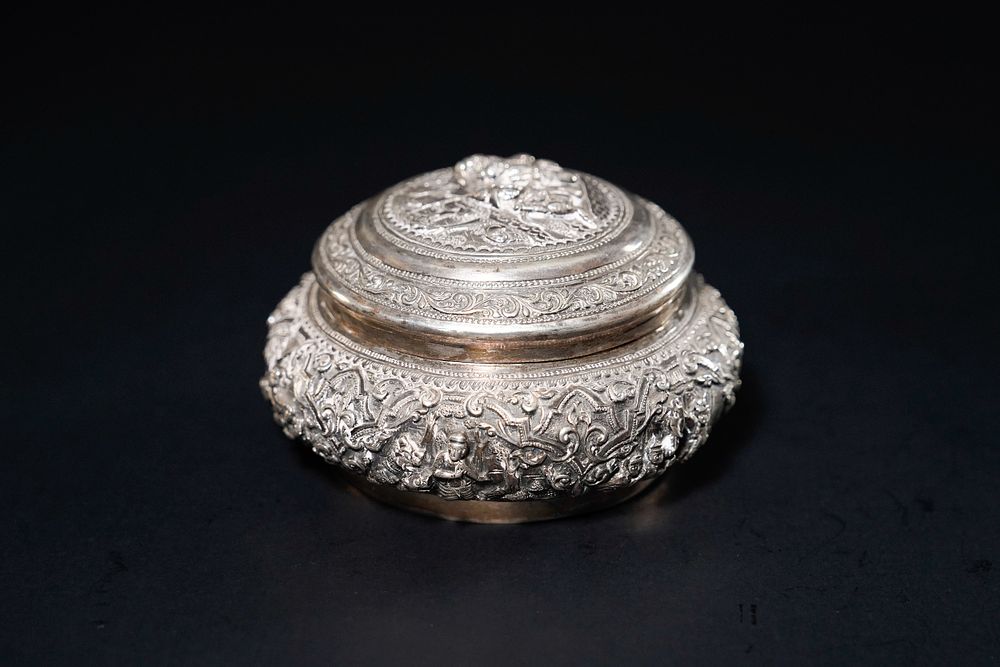 Lot 274: A Burmese Repoussé Silver Lidded Box.