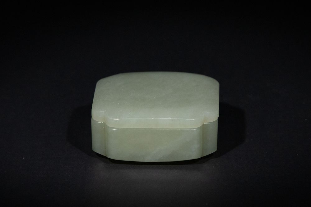 Lot 313: A Chinese Pale Celadon Jade Lidded Box.